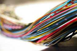 Manufacturing execution system (MES) controls and records the production process of automotive wiring harnesses